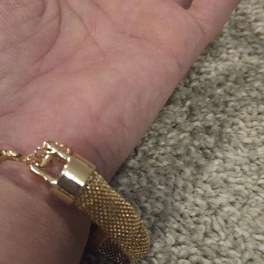 Elegant Gold Snake Bracelet with Green and Red Accents